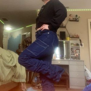 Blue baggy jeans touched for baggy appearance